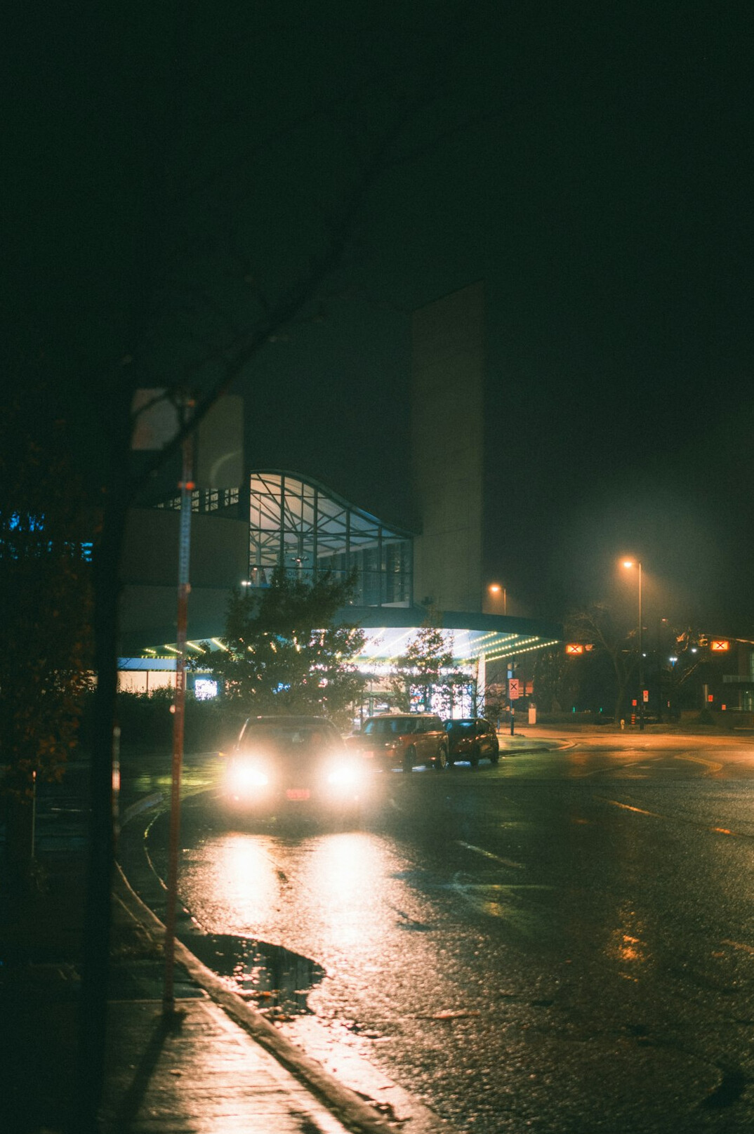rainy city street at night